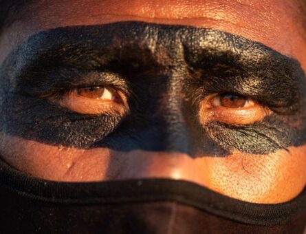 Indigenous latin american wearing a face mask